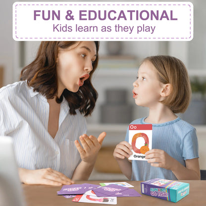 Mother and child playing alphabet flash card game, learning letters at home table