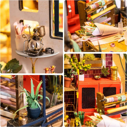 Miniature flower shop model with tiny plants, flowers, pots, and crafting tools on display