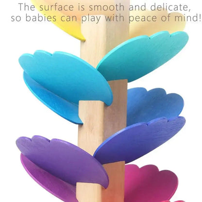 Colorful wooden marble run toy with smooth, scalloped tracks for babies and toddlers